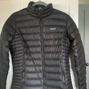 Patagonia women’s black size medium puffer jacket.